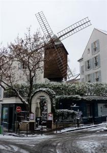 Photo of the Moulin de la Galette in the snow, by Jeff Berner